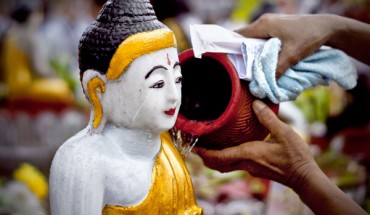 Watering Buddha image in Kason Festival