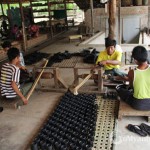 Artisans in a lacquer ware workshop, Bagan