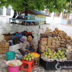 Burmese lady selling traditional products in Yangon