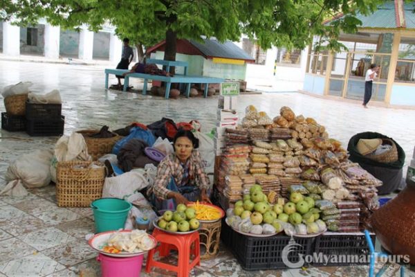 Burmese lady selling traditional products in Yangon