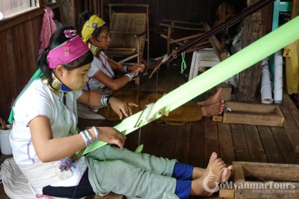 Long neck young ladies weaving in Inle Lake