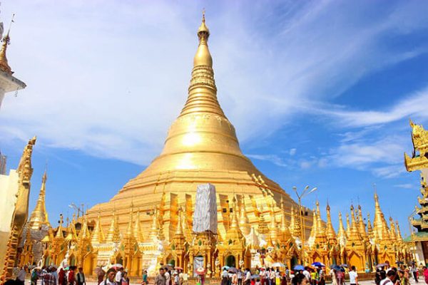 shwedagon pagoda glittering its light on a sunny day