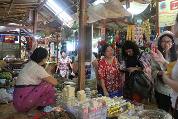 talk with the local in nyaung u market - worth trying experience in myanmar tour