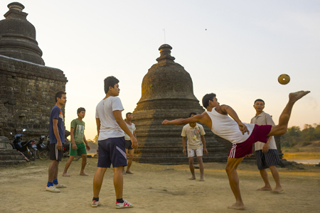 Men Playing Chinlone In Front Of Stupas, Myanmar