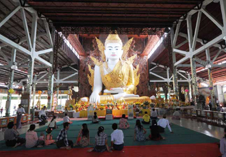 In the prayer hall of the Ngar Htat Gyi Buddha Image, Yangon, Myanmar
