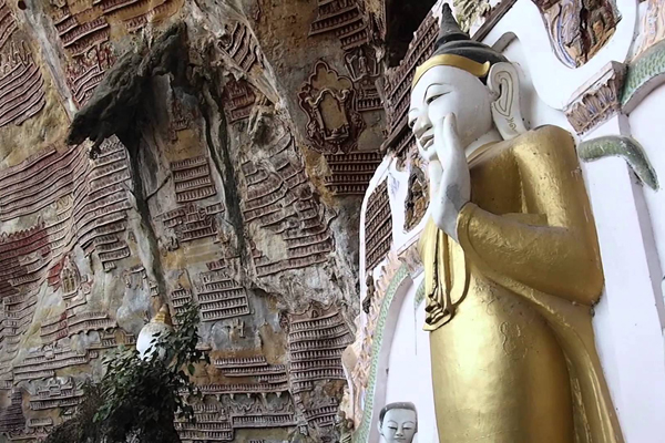 Standing Buddha image in Kawgun Cave