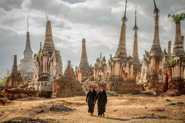 Two Pa o ethnic women in the ruins of Indein Temple