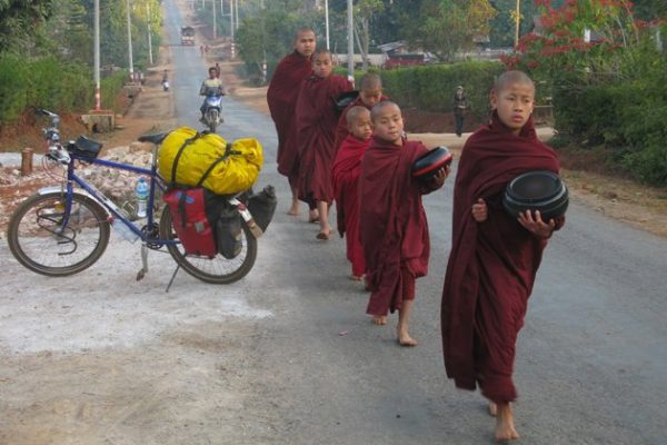 Little monks walking downtown for alms giving, Ywa Ngan