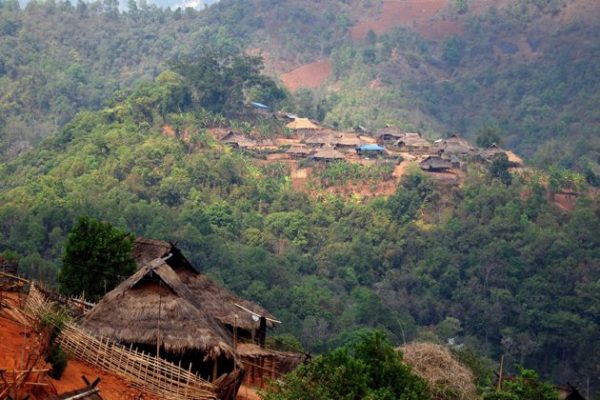 The village of Nor Shen in the distance, trekking near Kengtung