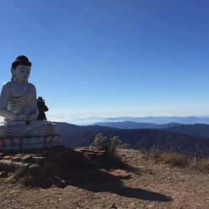 the Buddha statue on the top of Nat Ma Taung