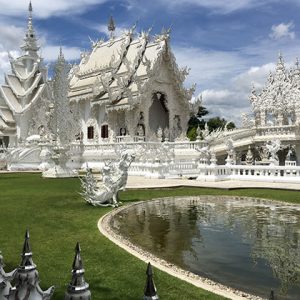 Wat Rong Khun temple is the impressive white and most recognizable temple in Thailand