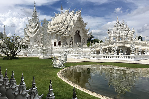 Wat Rong Khun temple is the impressive white and most recognizable temple in Thailand