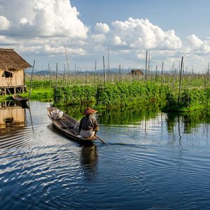 a man working on his floating garden