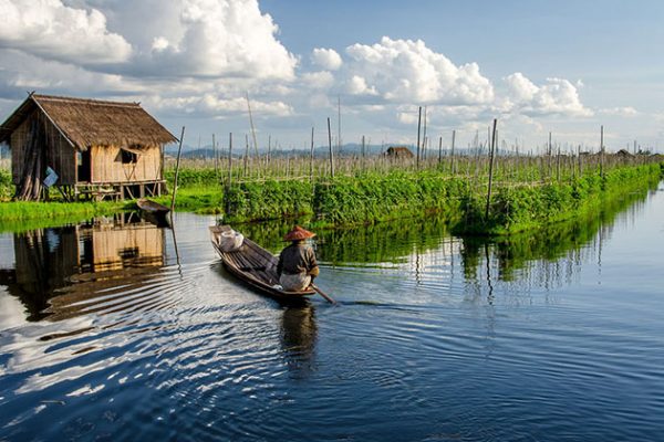a man working on his floating garden