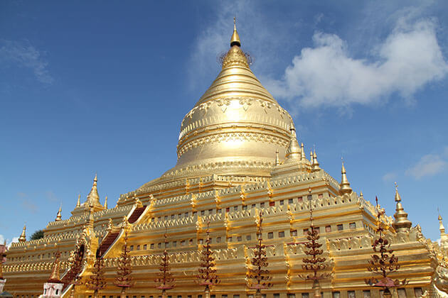 Shwezigon golden stupa glittering in the sunlight
