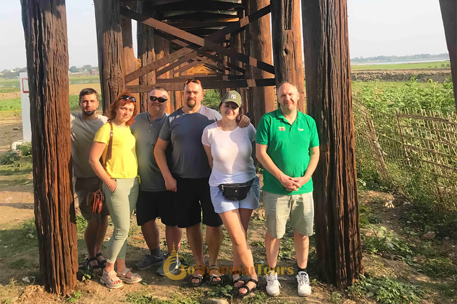 Group in u bein bridge - myanmar tour packages