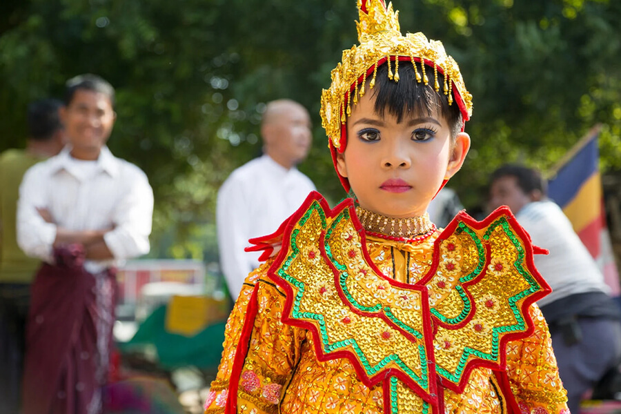 costumes makeup and golden royal outfits in Traditional Shin Pyu Ceremony
